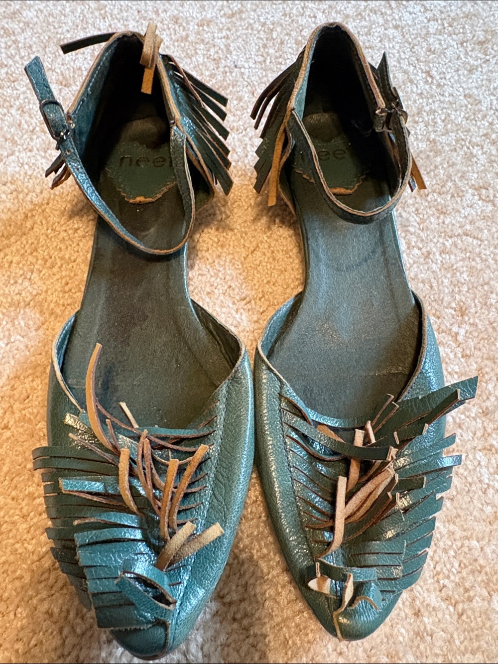 Neet teal fringe flats